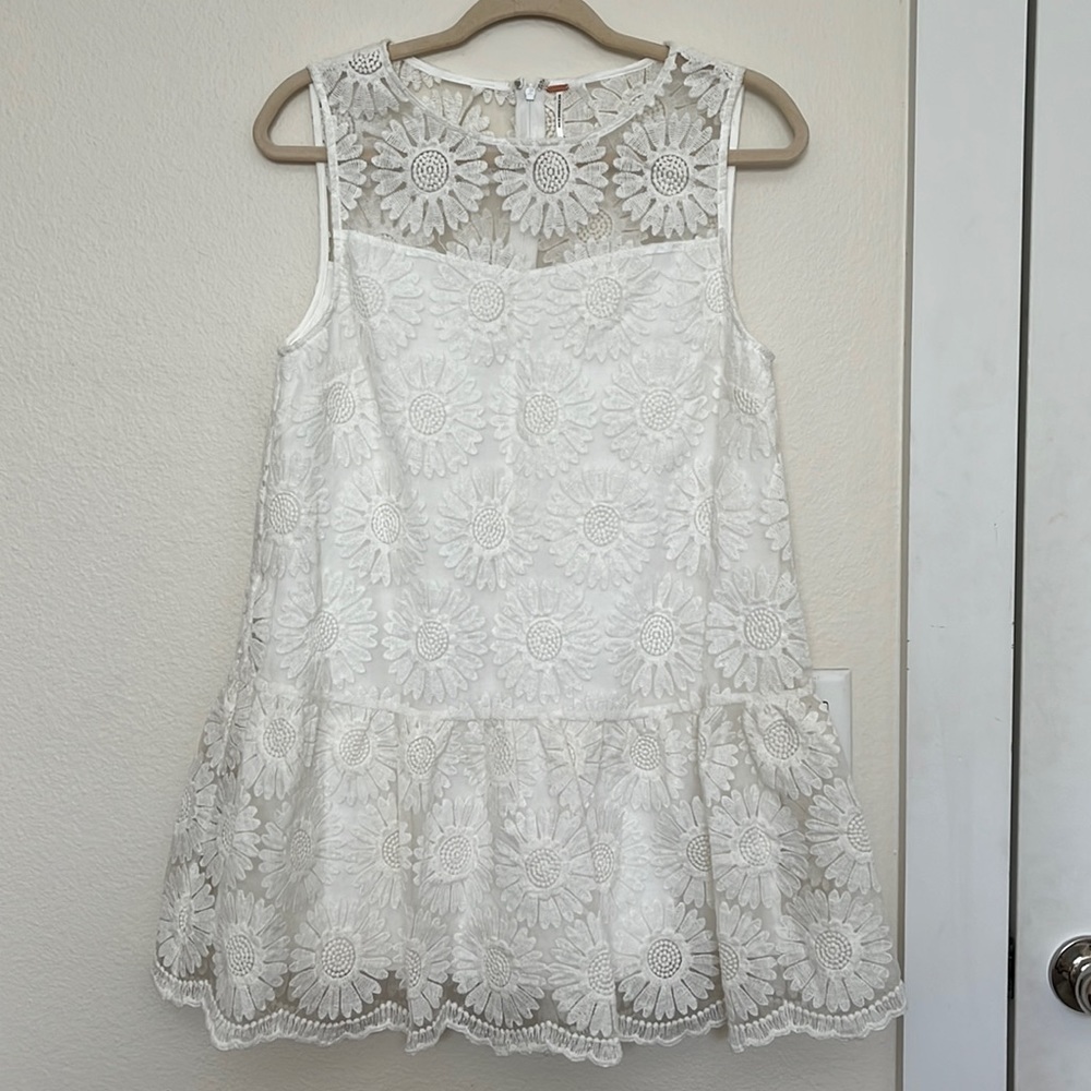 Free People white dress with crochet detail. Size S/P.